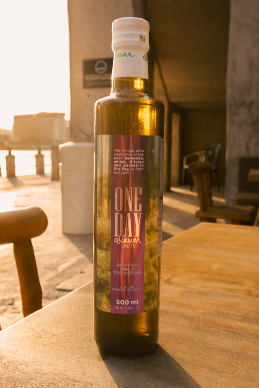 Fresh golden olive oil glowing in the light